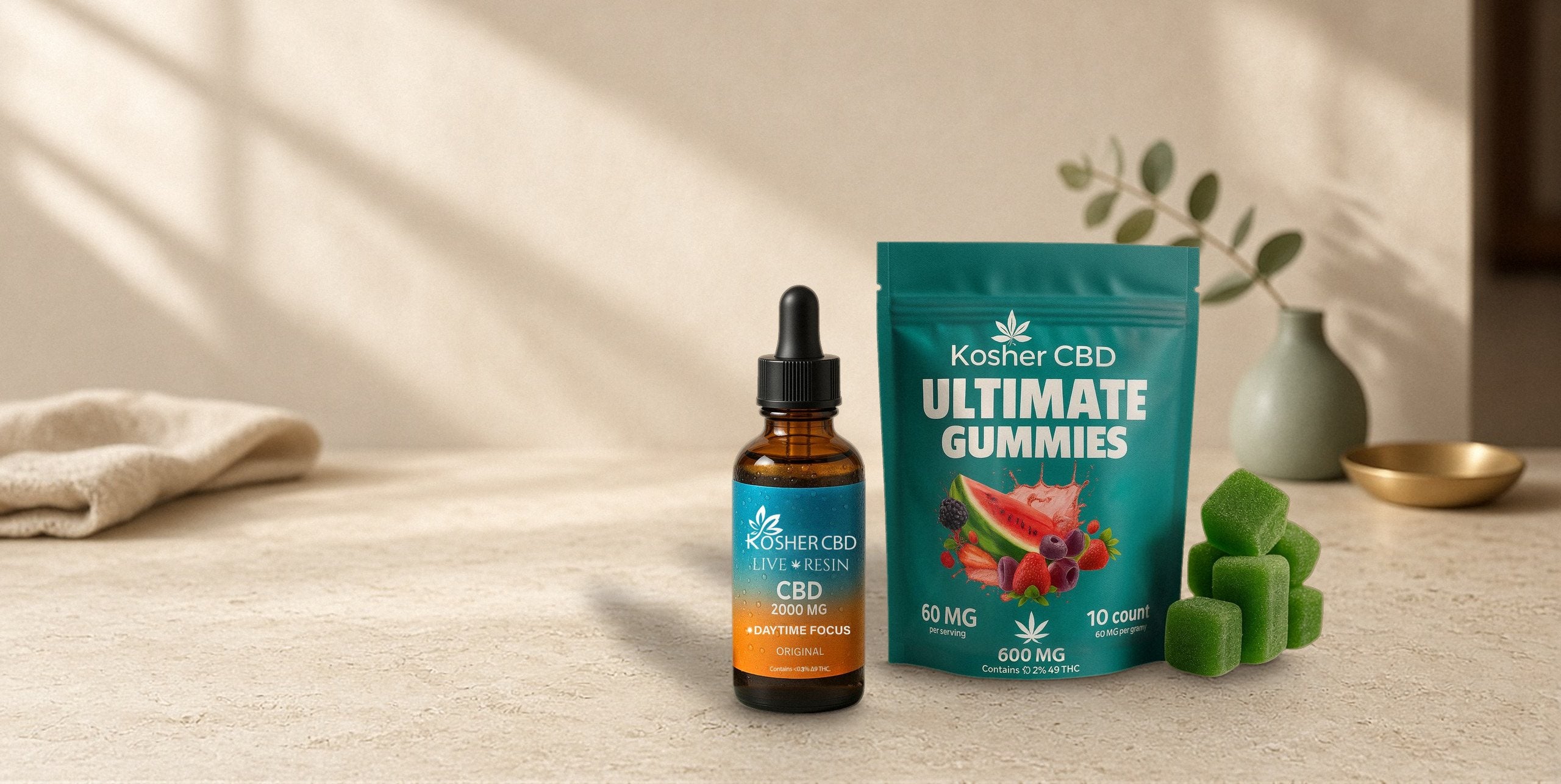 Kosher CBD Live Resin CBD Day Oil and Ultimate CBD Gummies on a cream stone counter